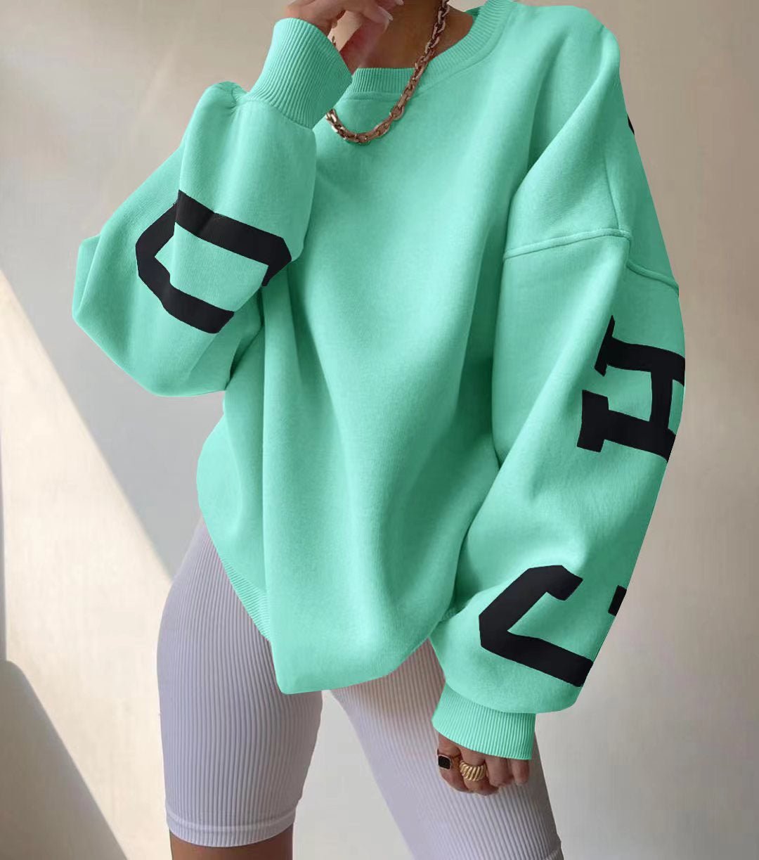 Polerón oversize de polar con diseño universitario para mujer