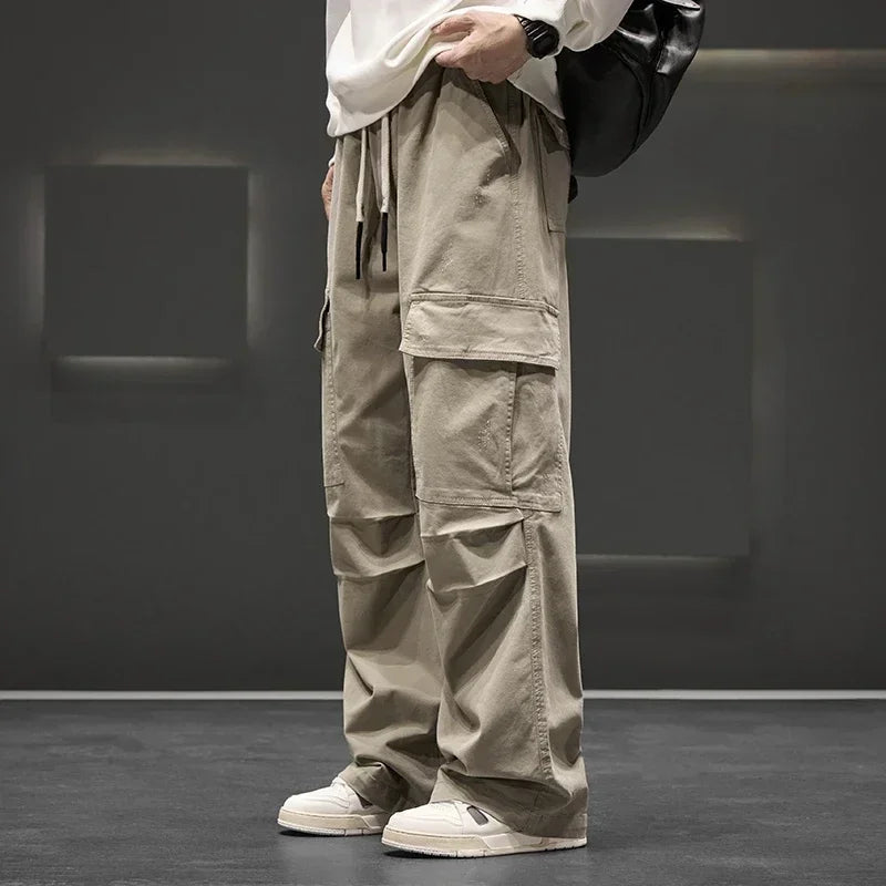 Pantalones cargo de pierna ancha con bolsillos utilitarios para hombre