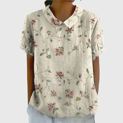 Blusa de manga corta para mujer con detalle floral en el cuello