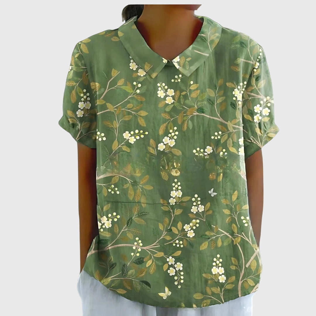 Blusa de manga corta para mujer con detalle floral en el cuello
