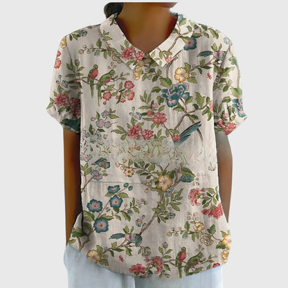 Blusa de manga corta para mujer con detalle floral en el cuello