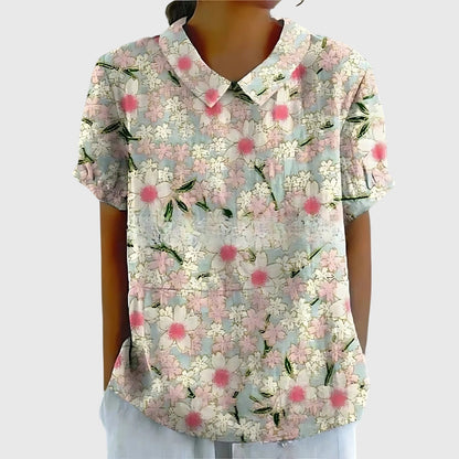 Blusa de manga corta para mujer con detalle floral en el cuello