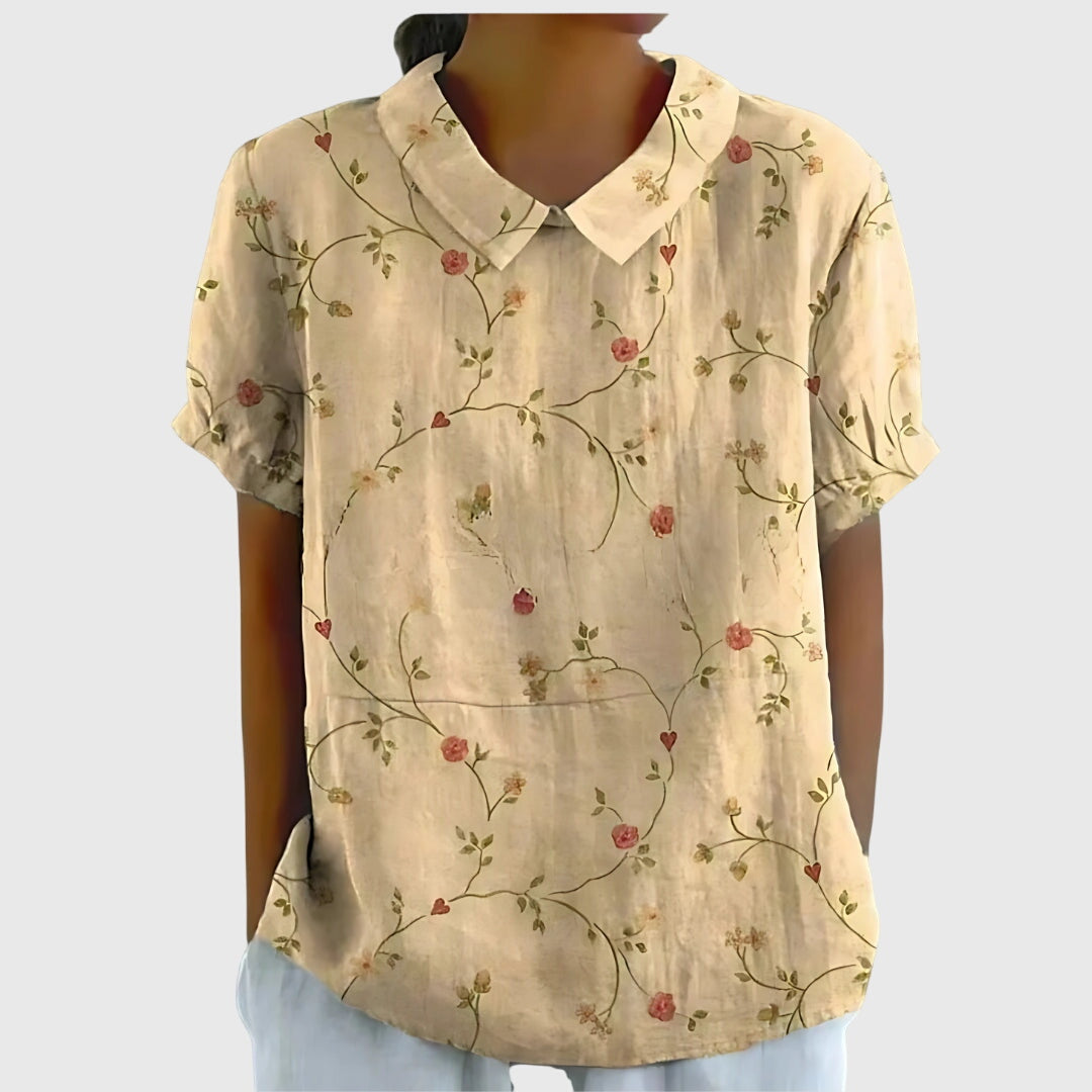 Blusa de manga corta para mujer con detalle floral en el cuello