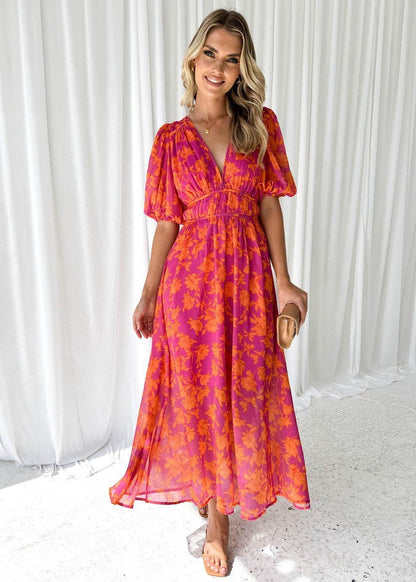 Vestido midi floral vaporoso con cuello en V y mangas abullonadas para mujer