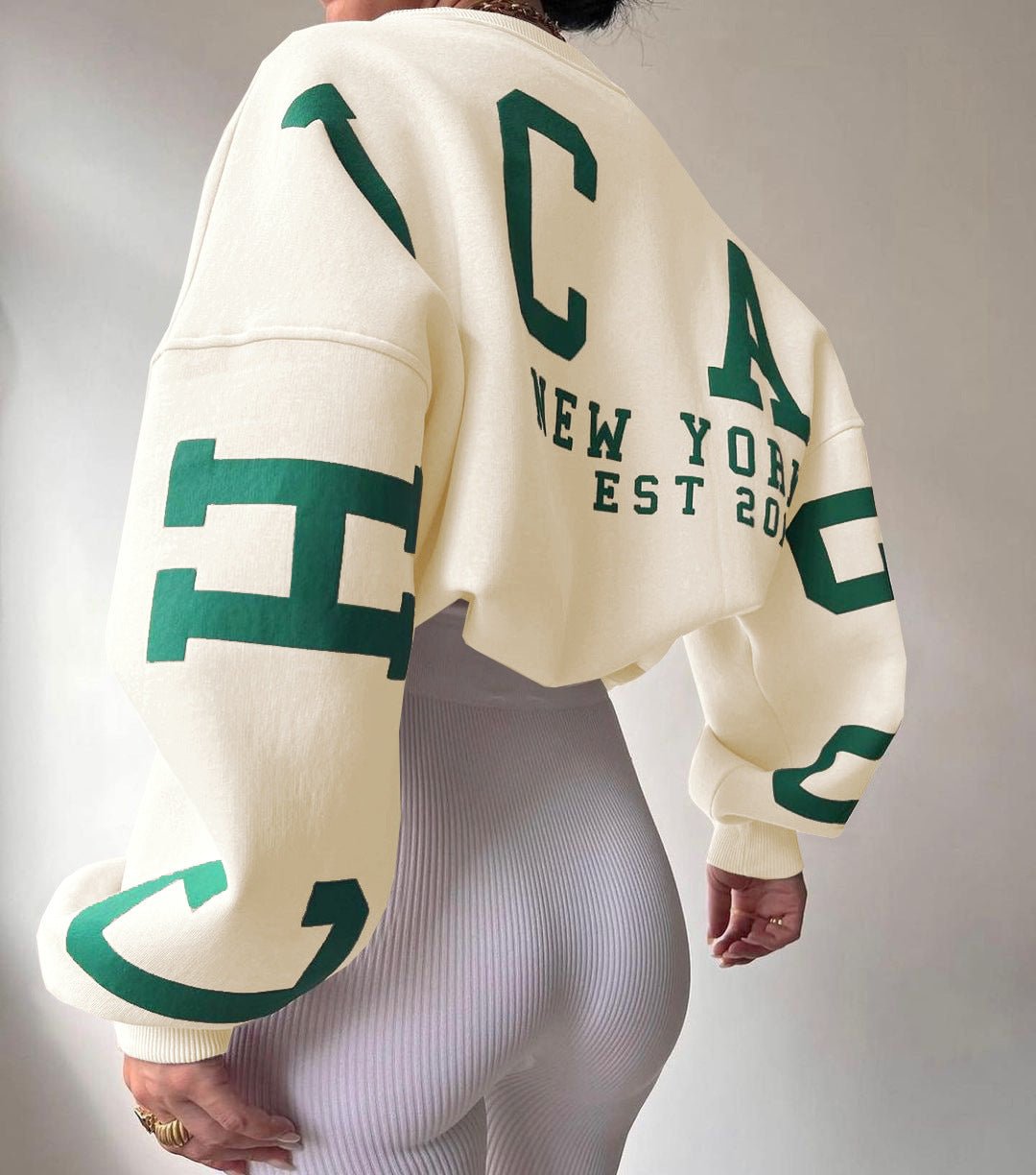 Polerón oversize de polar con diseño universitario para mujer