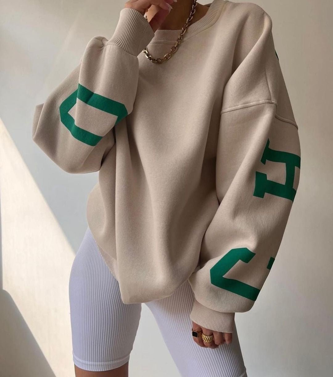 Polerón oversize de polar con diseño universitario para mujer