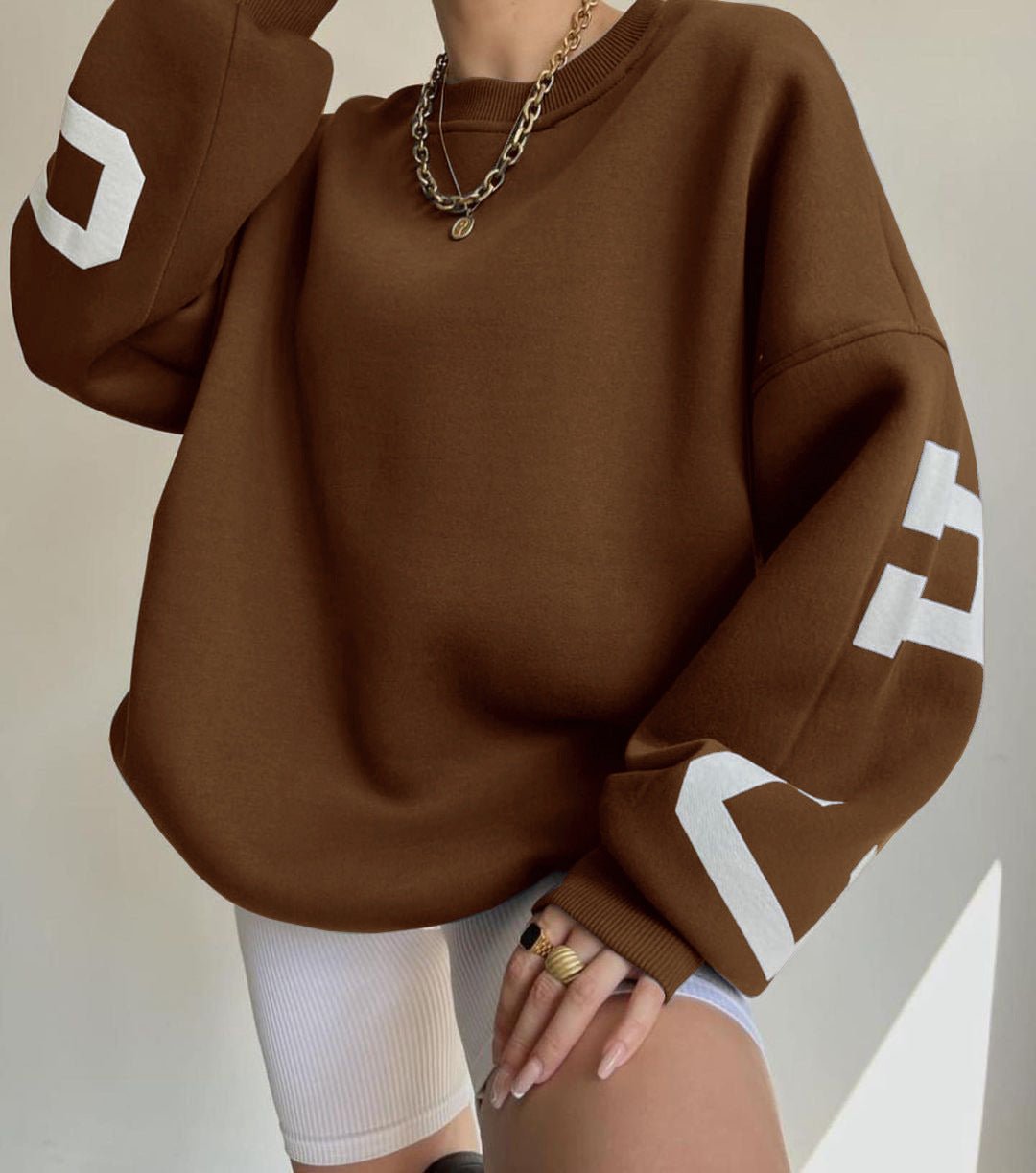 Polerón oversize de polar con diseño universitario para mujer