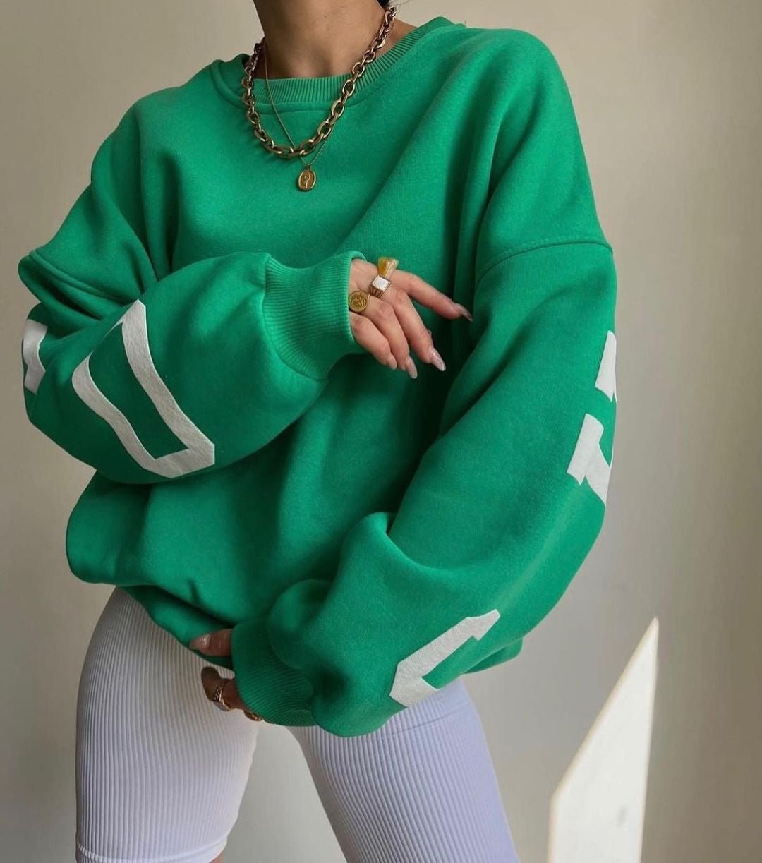 Polerón oversize de polar con diseño universitario para mujer