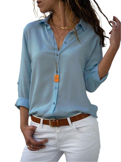 Blusa transpirable con botones y mangas arremangables para mujer