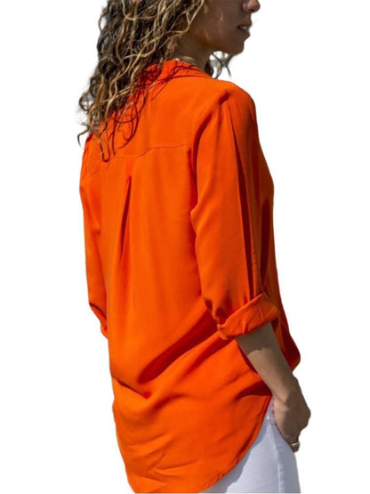 Blusa transpirable con botones y mangas arremangables para mujer
