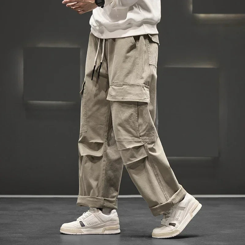 Pantalones cargo de pierna ancha con bolsillos utilitarios para hombre