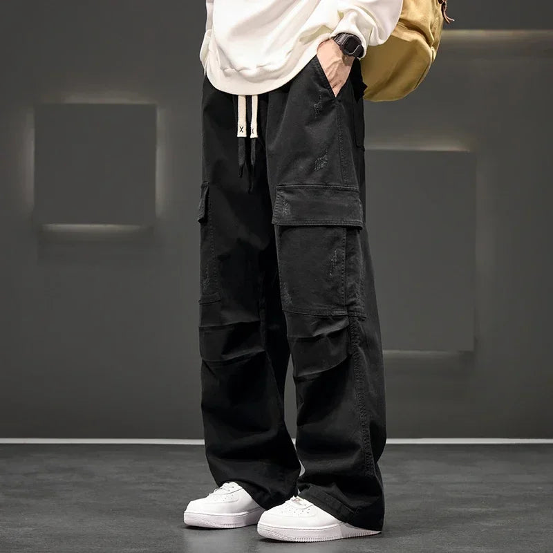 Pantalones cargo de pierna ancha con bolsillos utilitarios para hombre