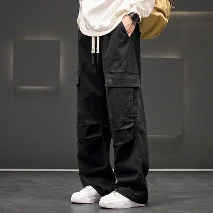Pantalones cargo de pierna ancha con bolsillos utilitarios para hombre