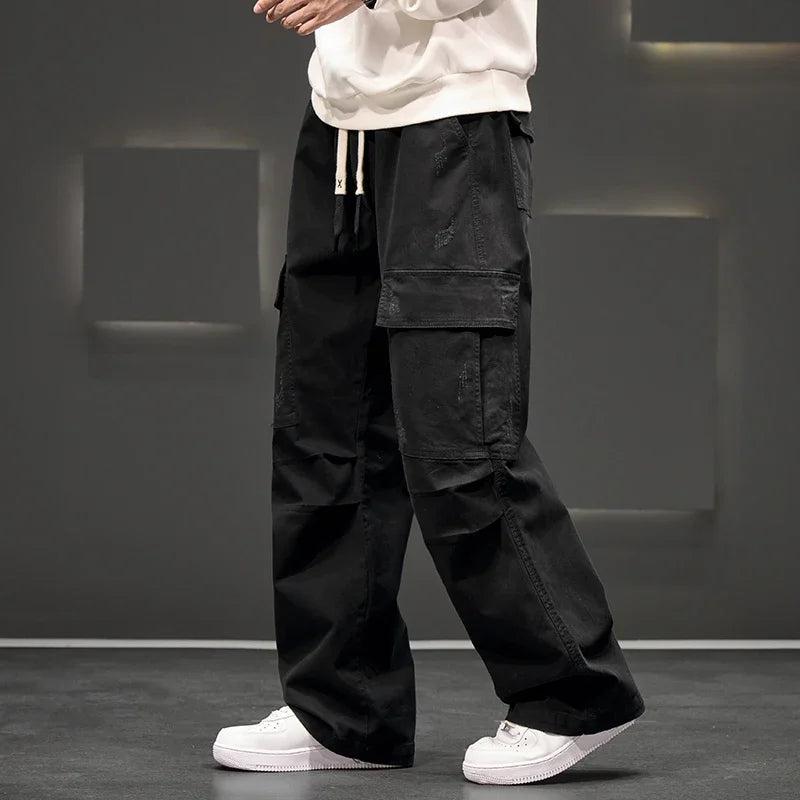 Pantalones cargo de pierna ancha con bolsillos utilitarios para hombre